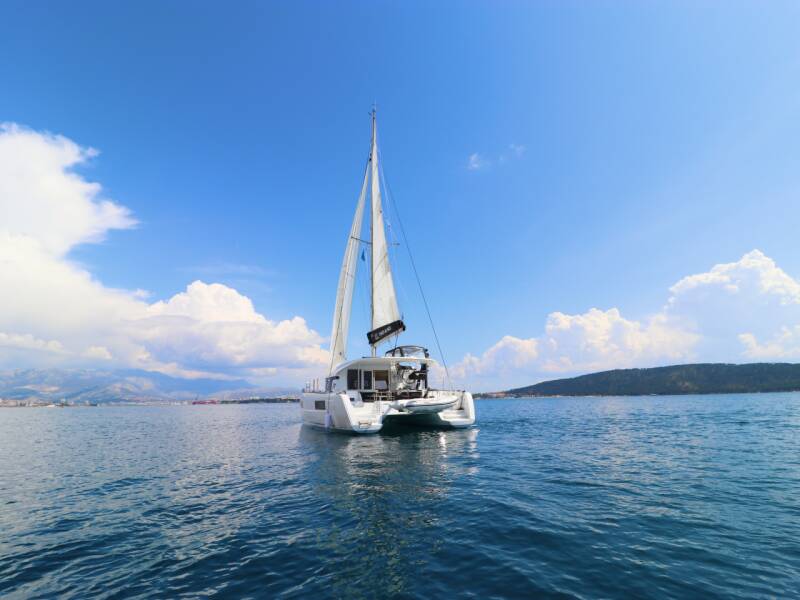Why is a catamaran the best option for a bigger crew?